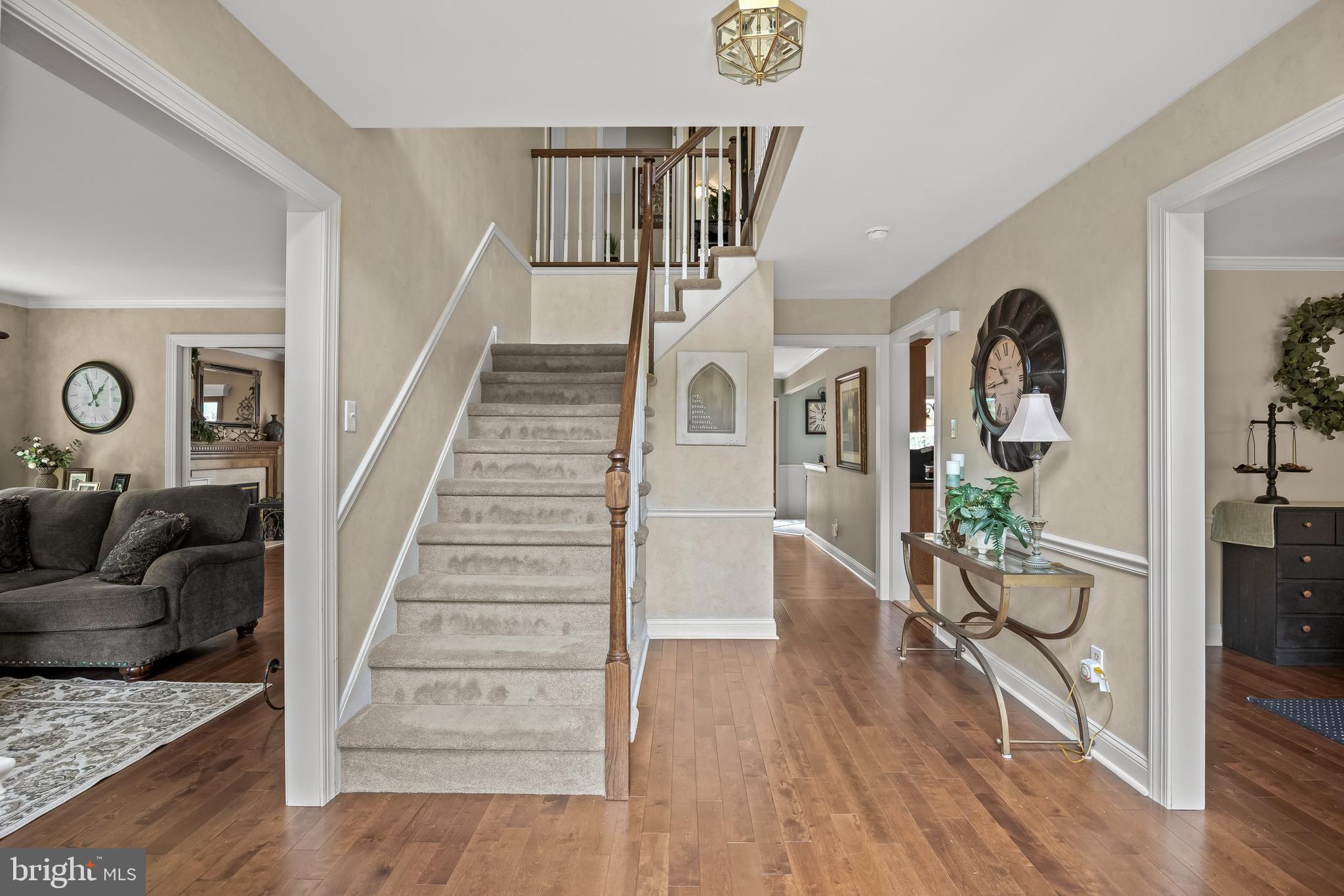 4 False Heather Way Medford, NJ 08055 - Photo 4 of 48 a view of entryway and hall with wooden floor