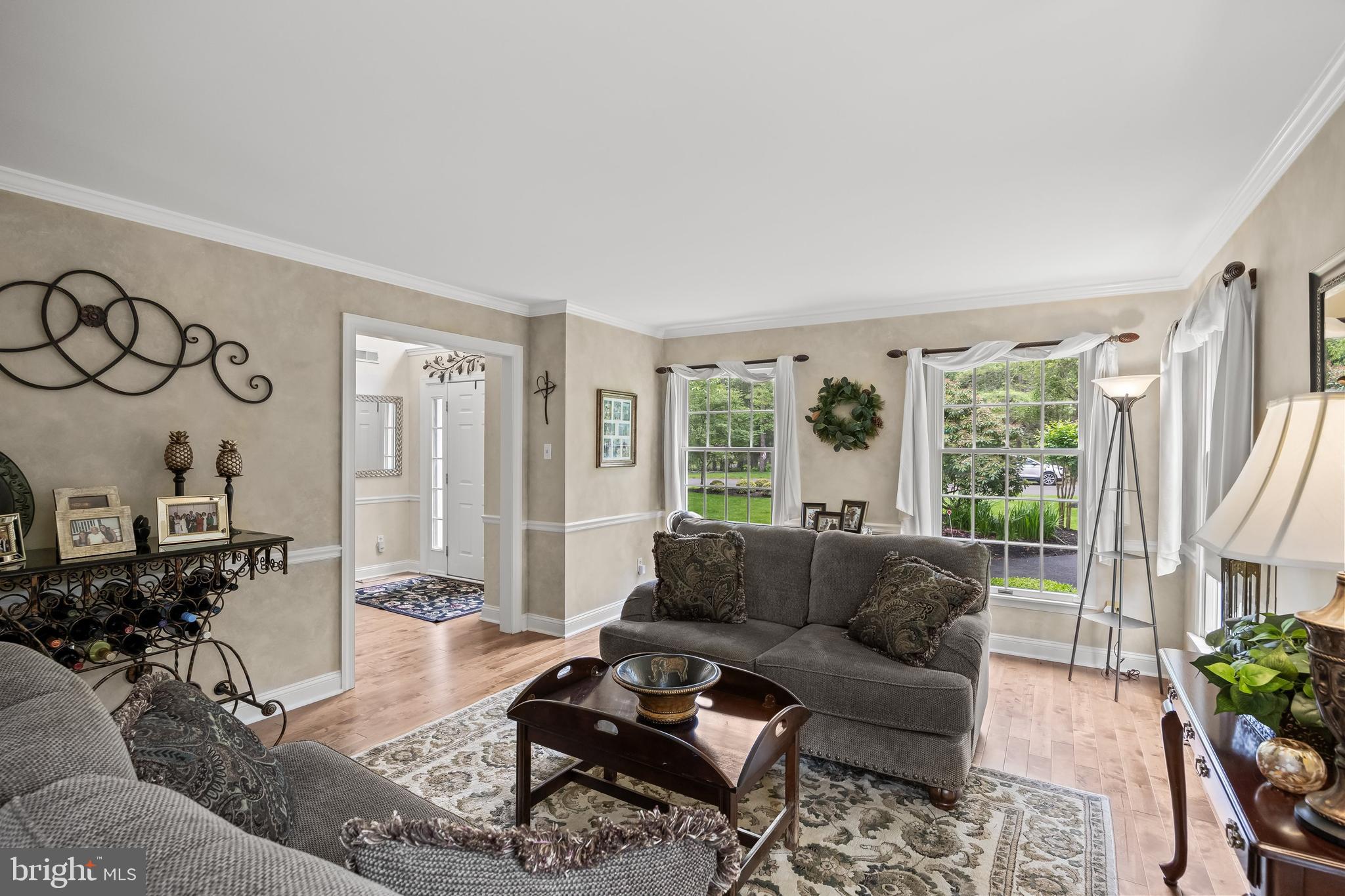 4 False Heather Way Medford, NJ 08055 - Photo 7 of 48 a living room with furniture and a large window