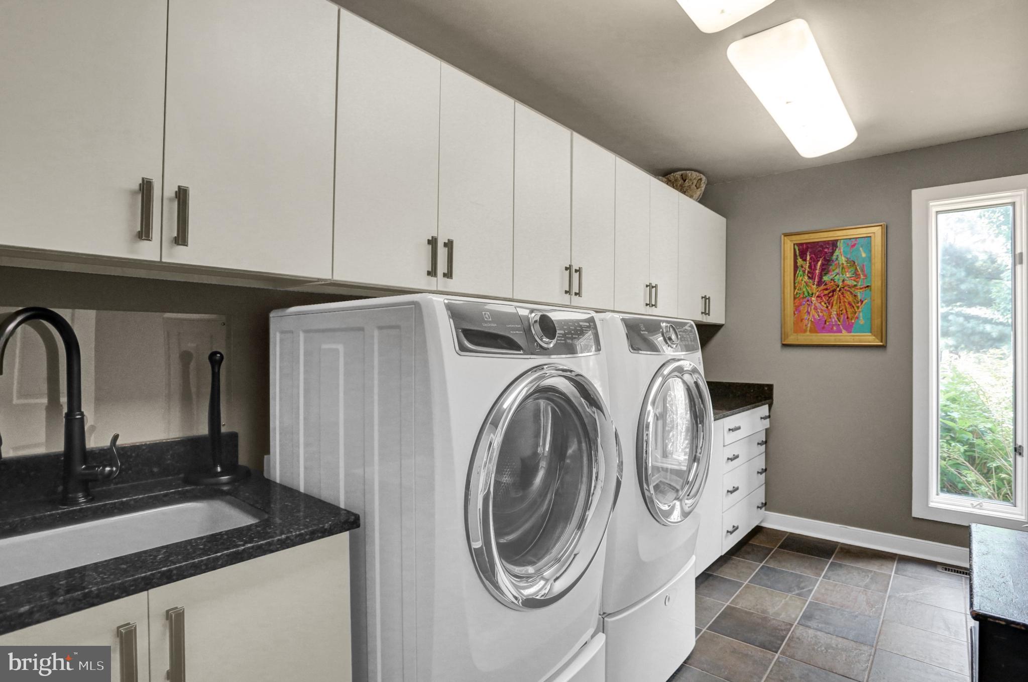 4 Forest Road Mohnton, PA 19540 - Photo 28 of 52 1st. Floor laundry w/abundant cabinets/tile floor