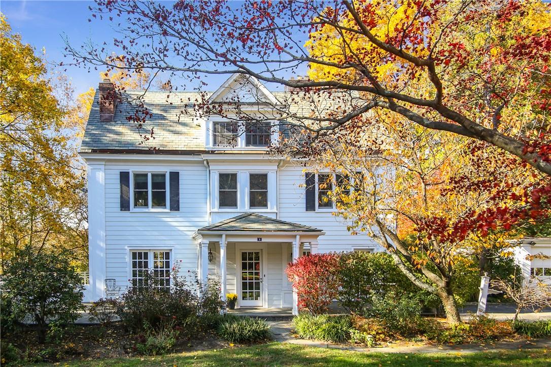 Gracious Colonial in the heart of Greenacres on over an acre of gorgeous property.
