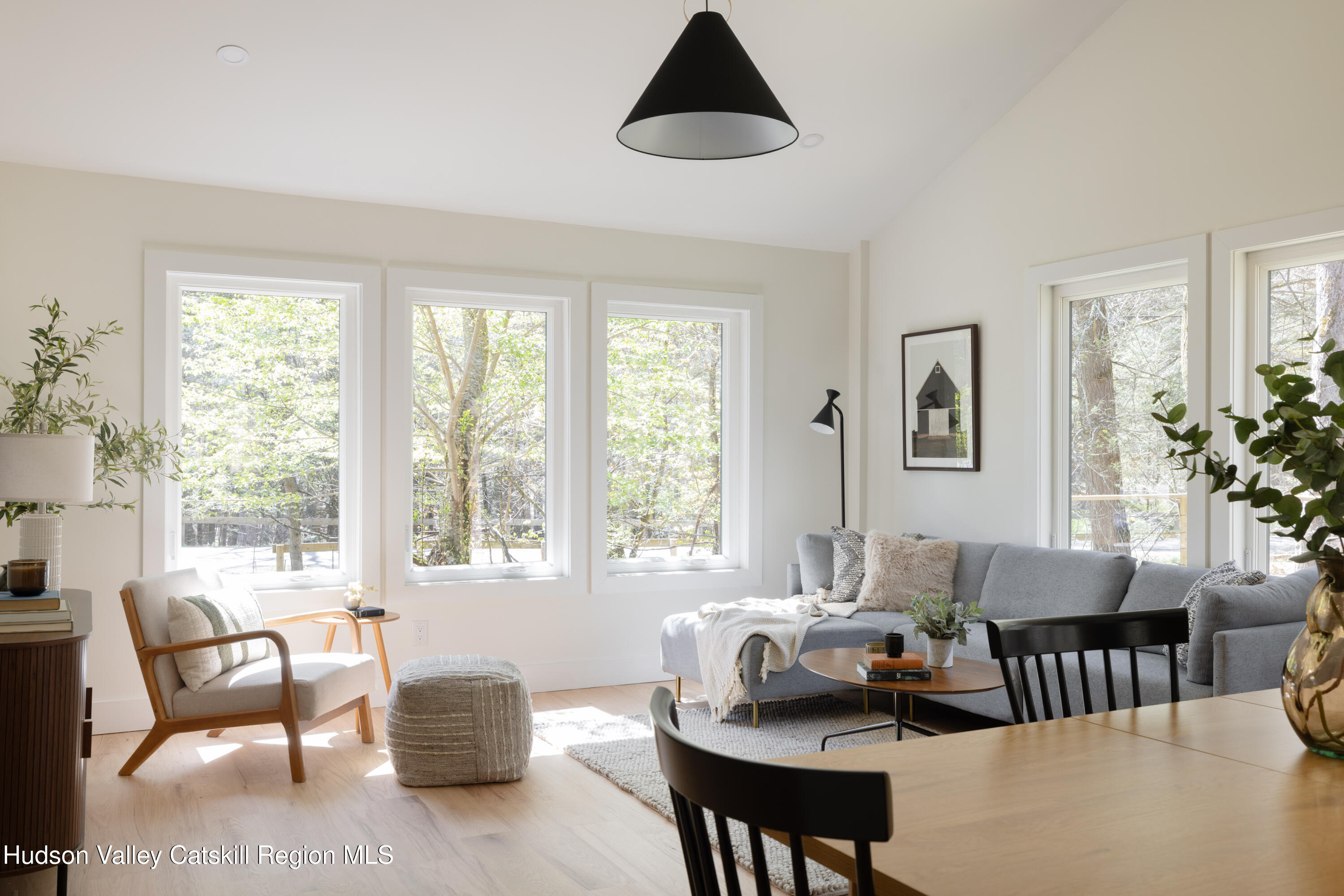92 Upper Cherrytown Road Kerhonkson, NY 12446 - Photo 2 of 36 a living room with furniture and a large window