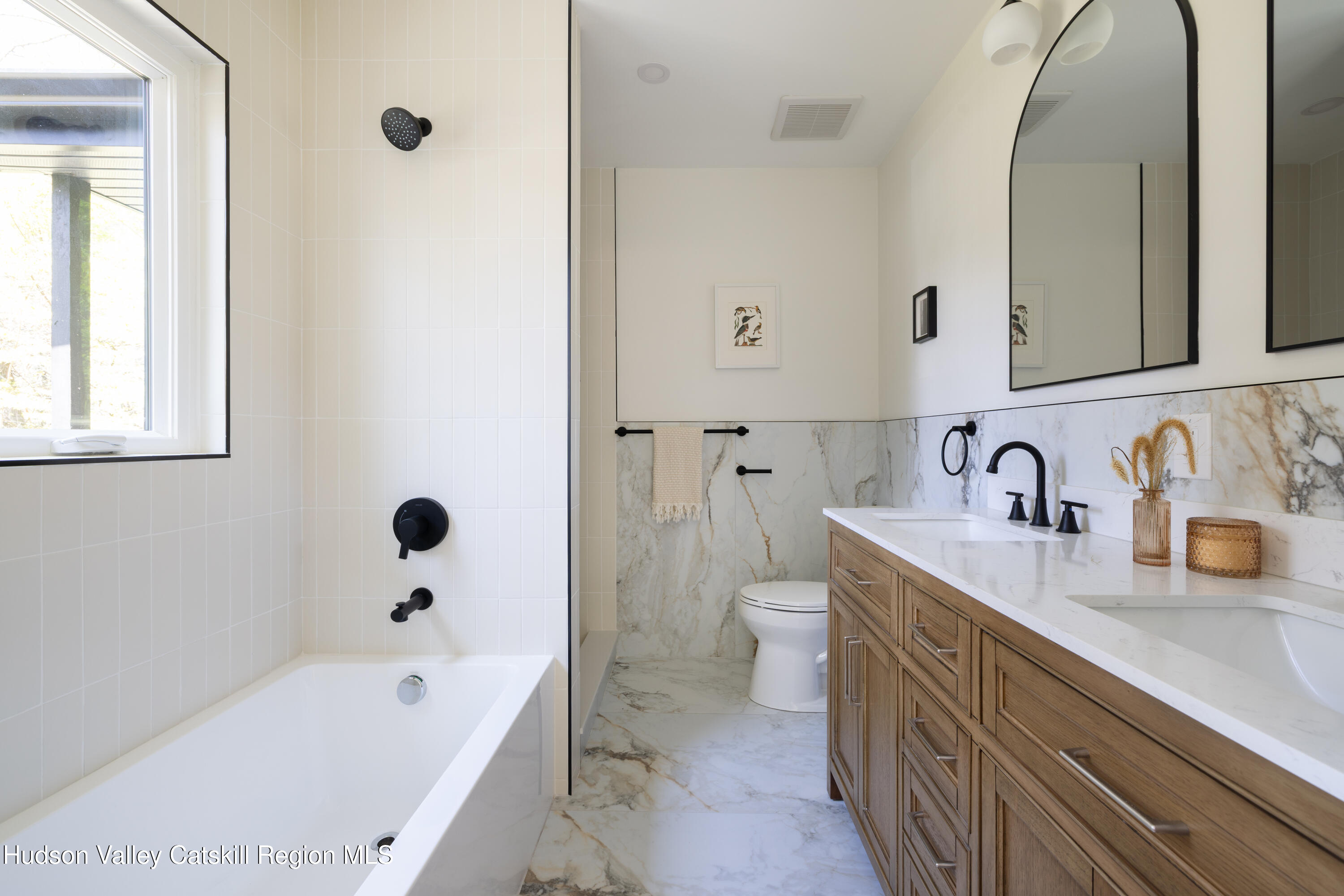 92 Upper Cherrytown Road Kerhonkson, NY 12446 - Photo 21 of 36 a bathroom with a tub sink toilet and a mirror