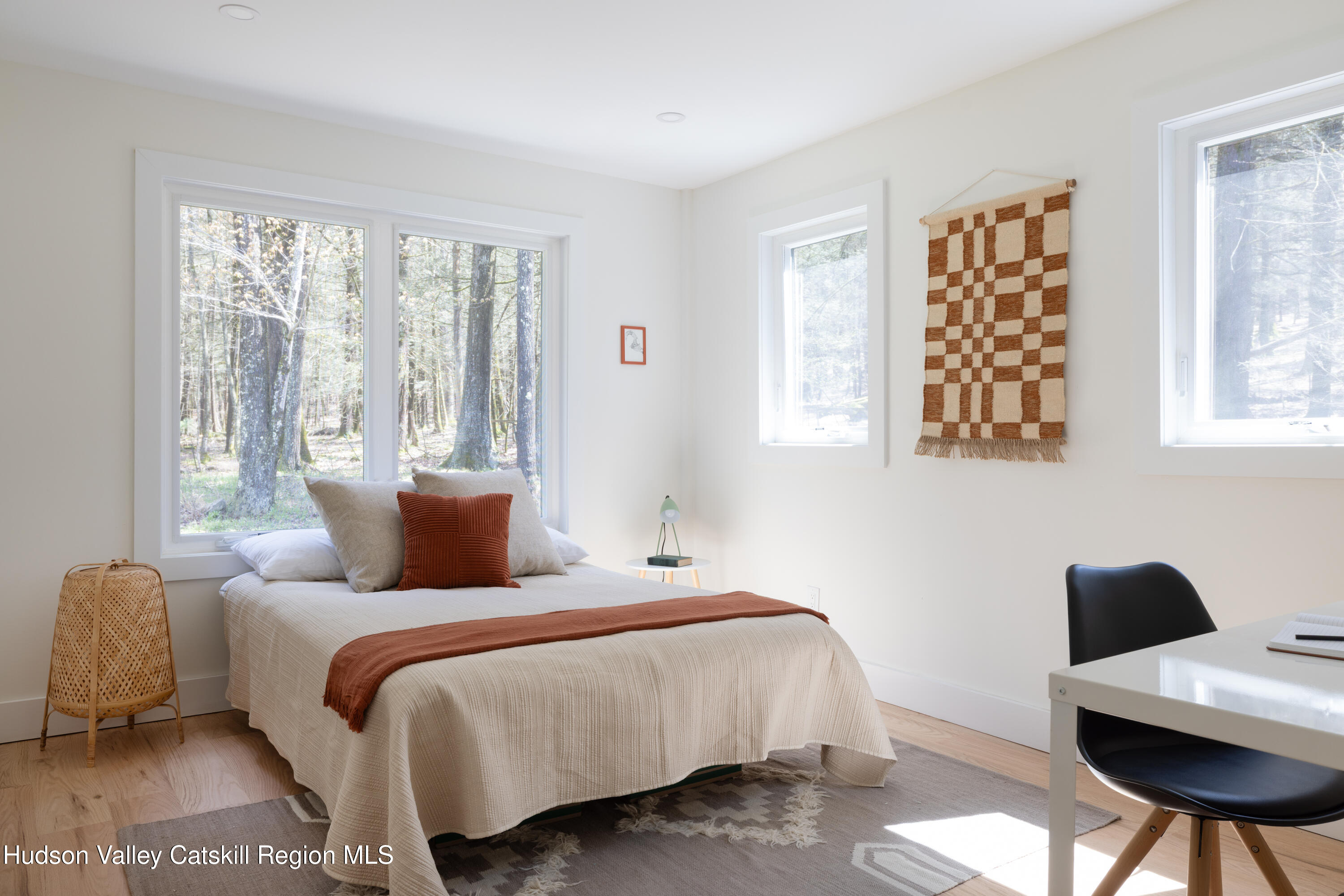 92 Upper Cherrytown Road Kerhonkson, NY 12446 - Photo 25 of 36 a bedroom with a bed and a window