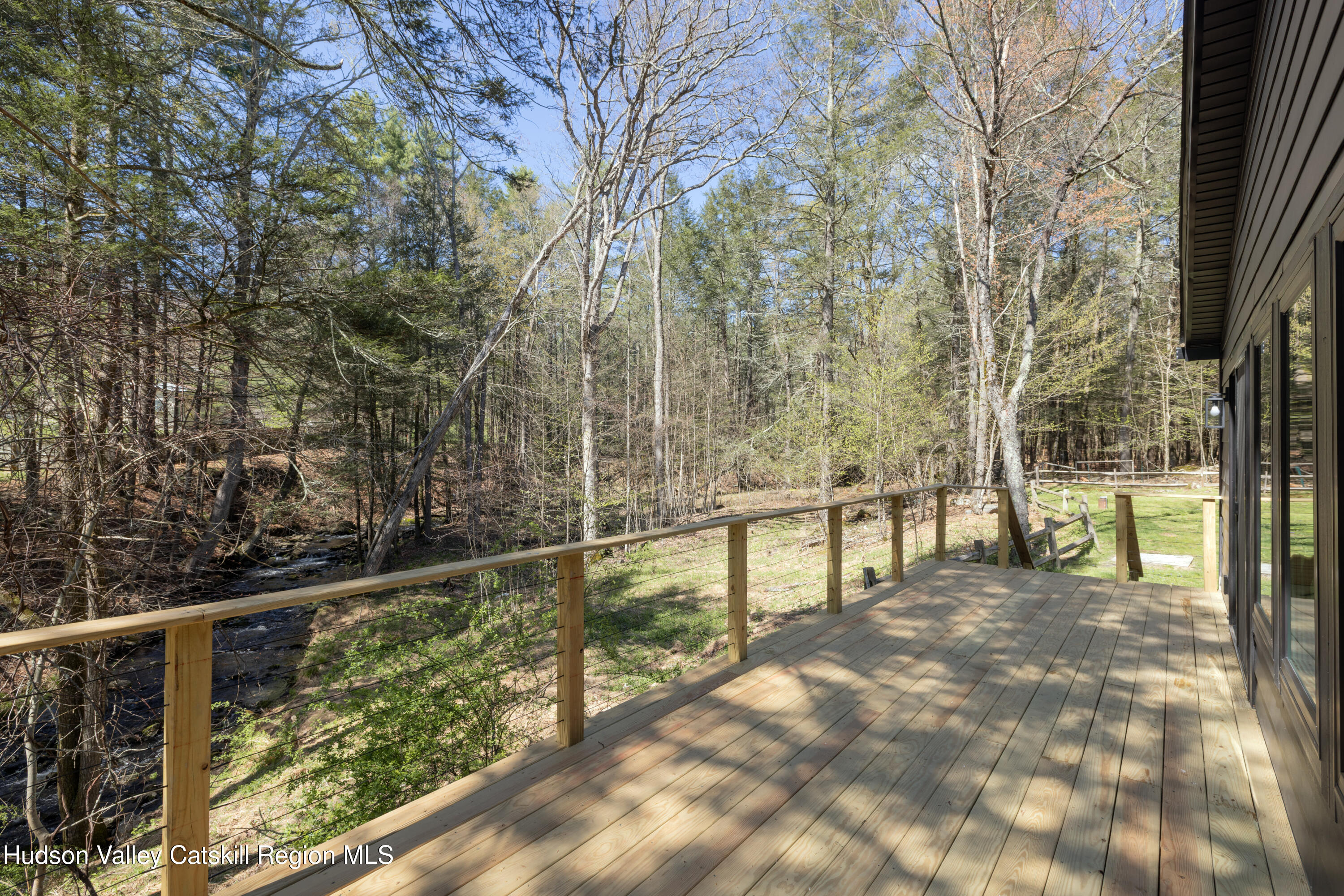 92 Upper Cherrytown Road Kerhonkson, NY 12446 - Photo 29 of 36 a view of a balcony with trees