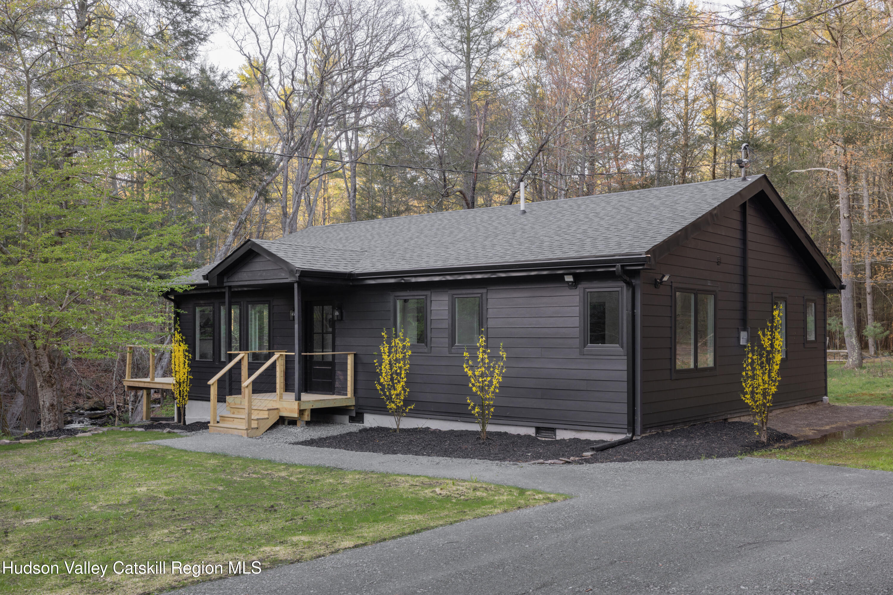 92 Upper Cherrytown Road Kerhonkson, NY 12446 - Photo 7 of 36 a view of a house with backyard