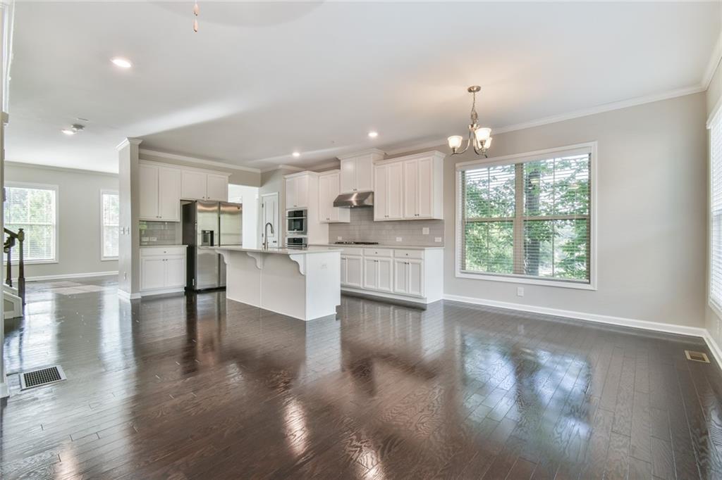 354 Provenance Drive Atlanta, GA 30328 - Photo 16 of 30 a view of kitchen with windows and refrigerator
