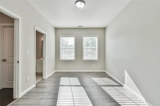 a view of a room with windows