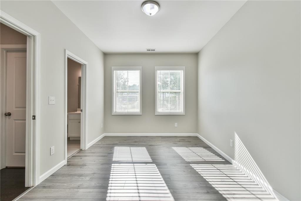 354 Provenance Drive Atlanta, GA 30328 - Photo 18 of 30 a view of a room with windows