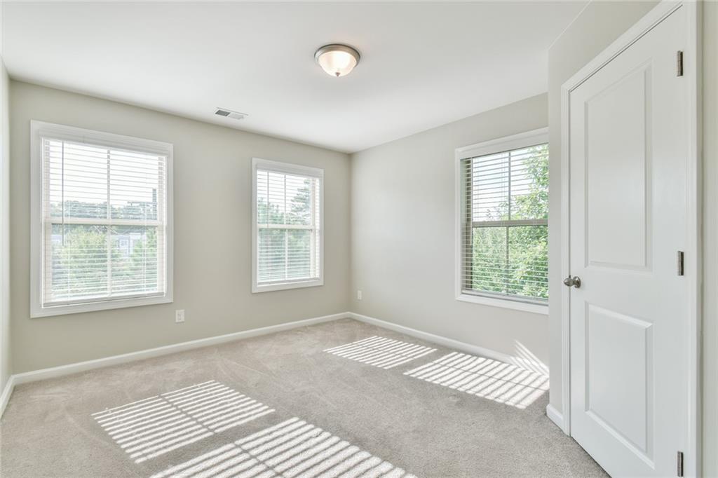 354 Provenance Drive Atlanta, GA 30328 - Photo 20 of 30 a view of a room with windows