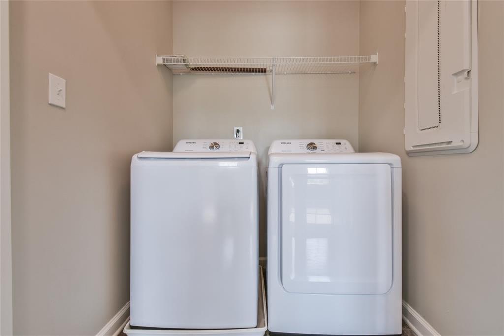 354 Provenance Drive Atlanta, GA 30328 - Photo 23 of 30 a utility room with dryer and washer