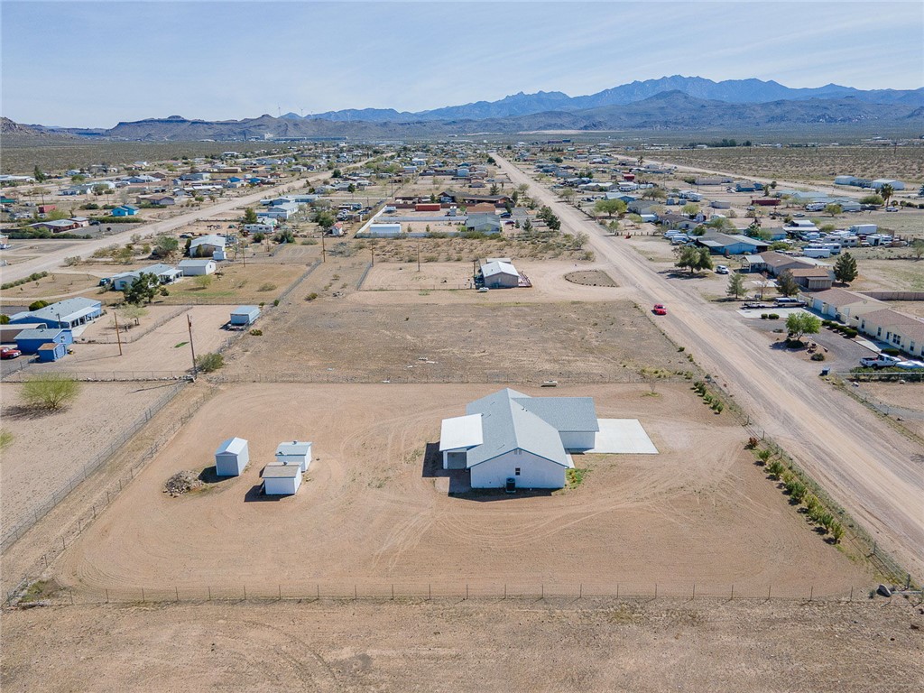 3411 West Carmichael Road Golden Valley, AZ 86413 - Photo 96 of 97 View of rural area with nearby suburban area and a mountain backdrop