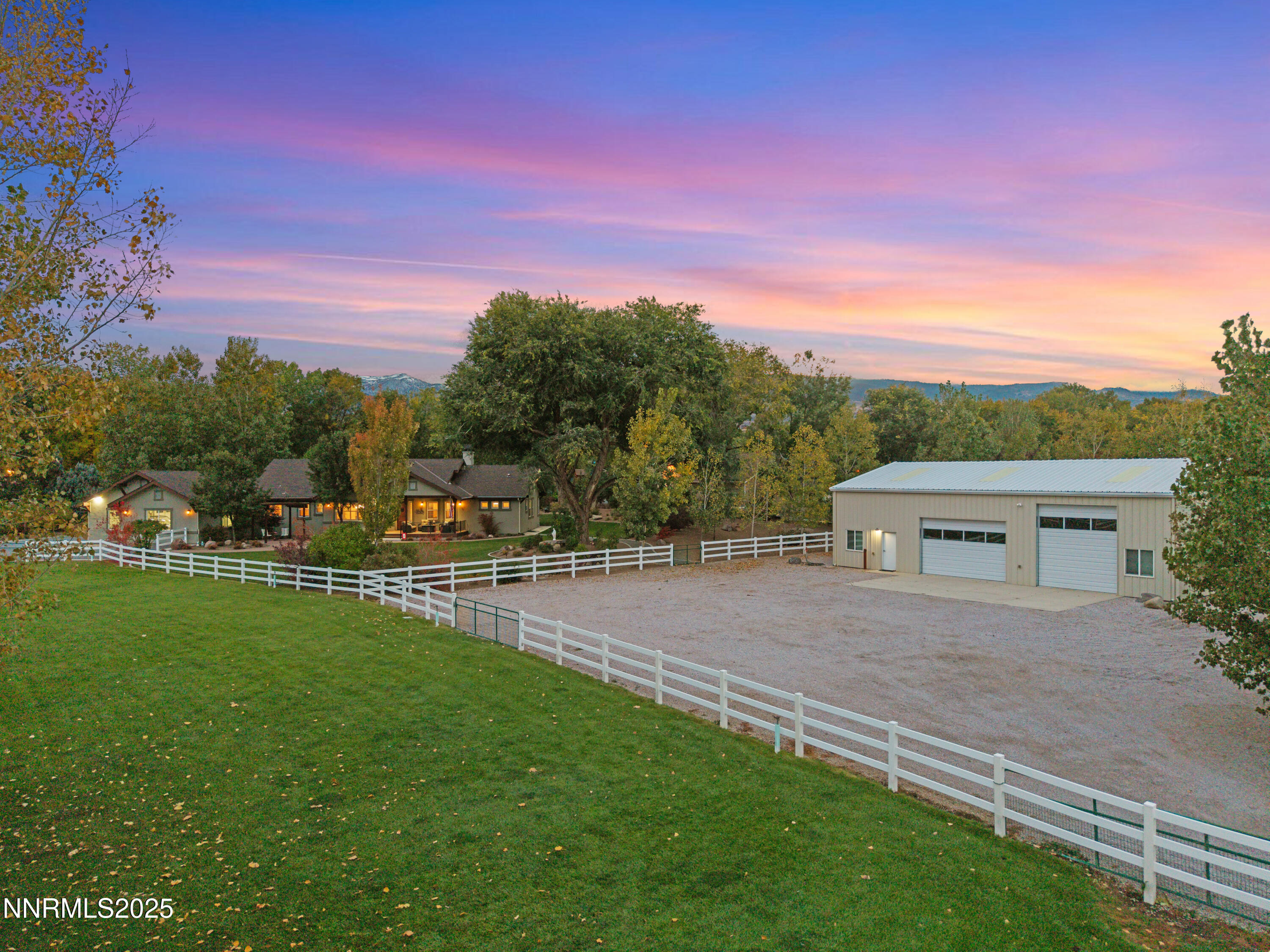 505 Sierra Manor Drive Reno, NV 89511 - Photo 3 of 36 a front view of a house with a yard