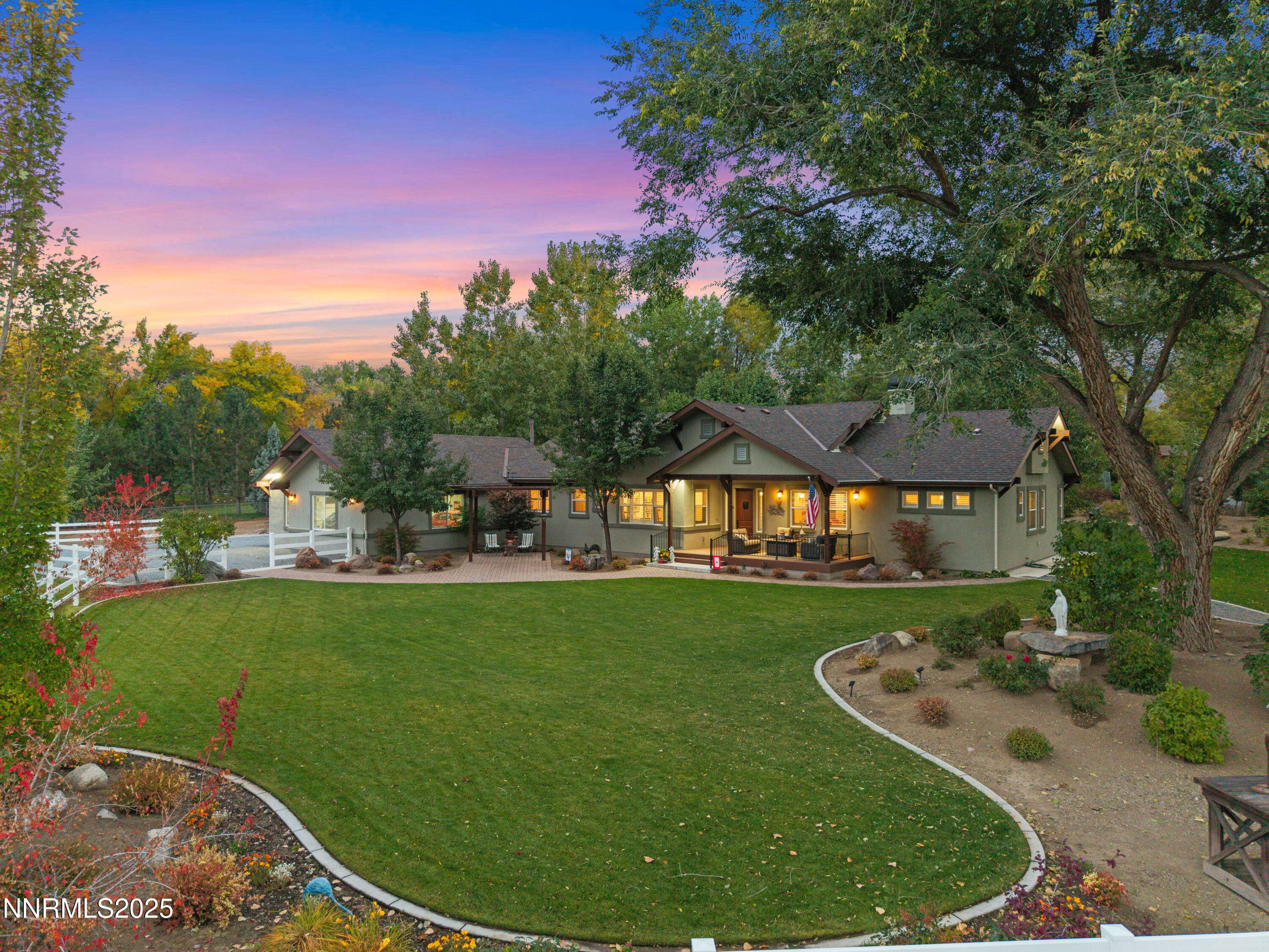 505 Sierra Manor Drive Reno, NV 89511 - Photo 4 of 36 a view of a fountain in front of a house