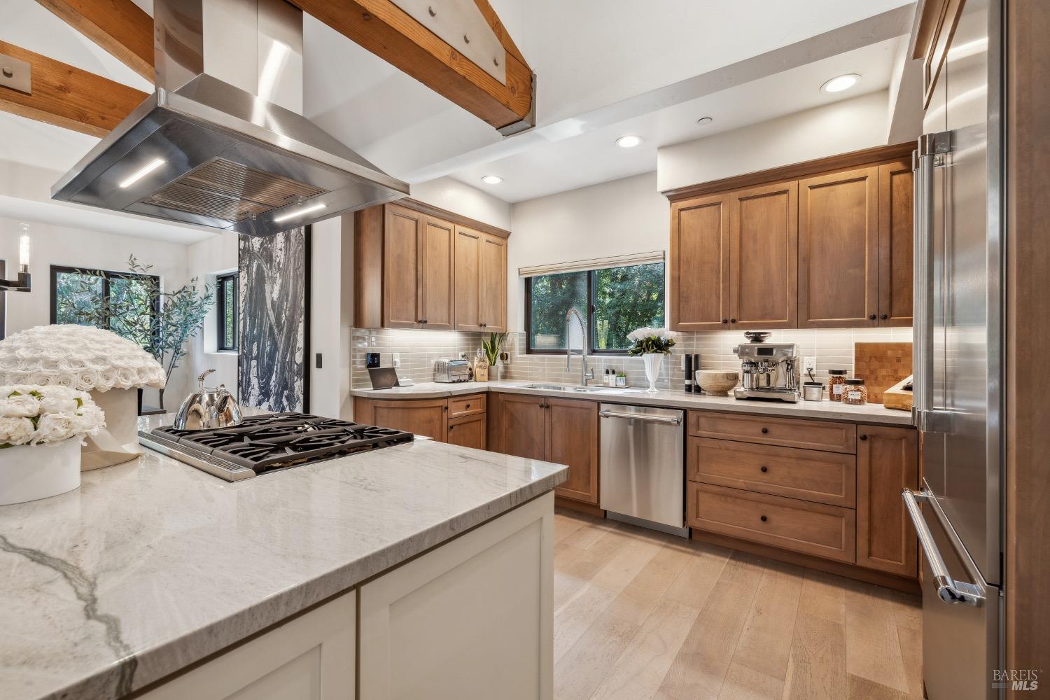 86 Fair Drive San Rafael, CA 94901 - Photo 11 of 65 a kitchen with granite countertop a sink stainless steel appliances and cabinets
