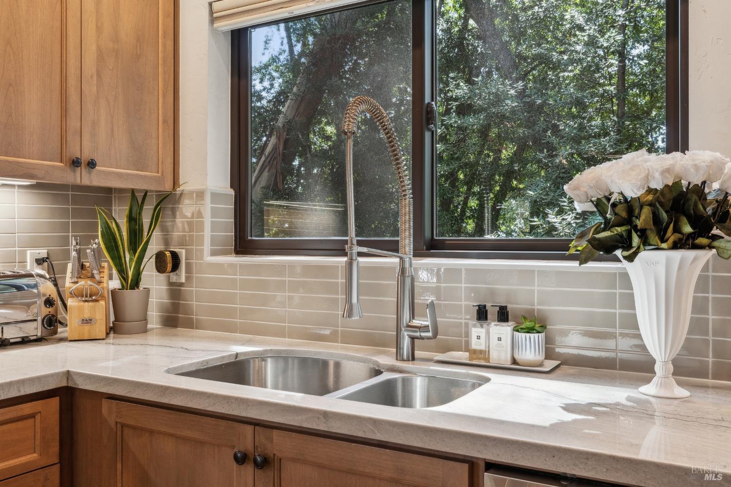 86 Fair Drive San Rafael, CA 94901 - Photo 12 of 65 a kitchen sink with a granite countertop window and sink