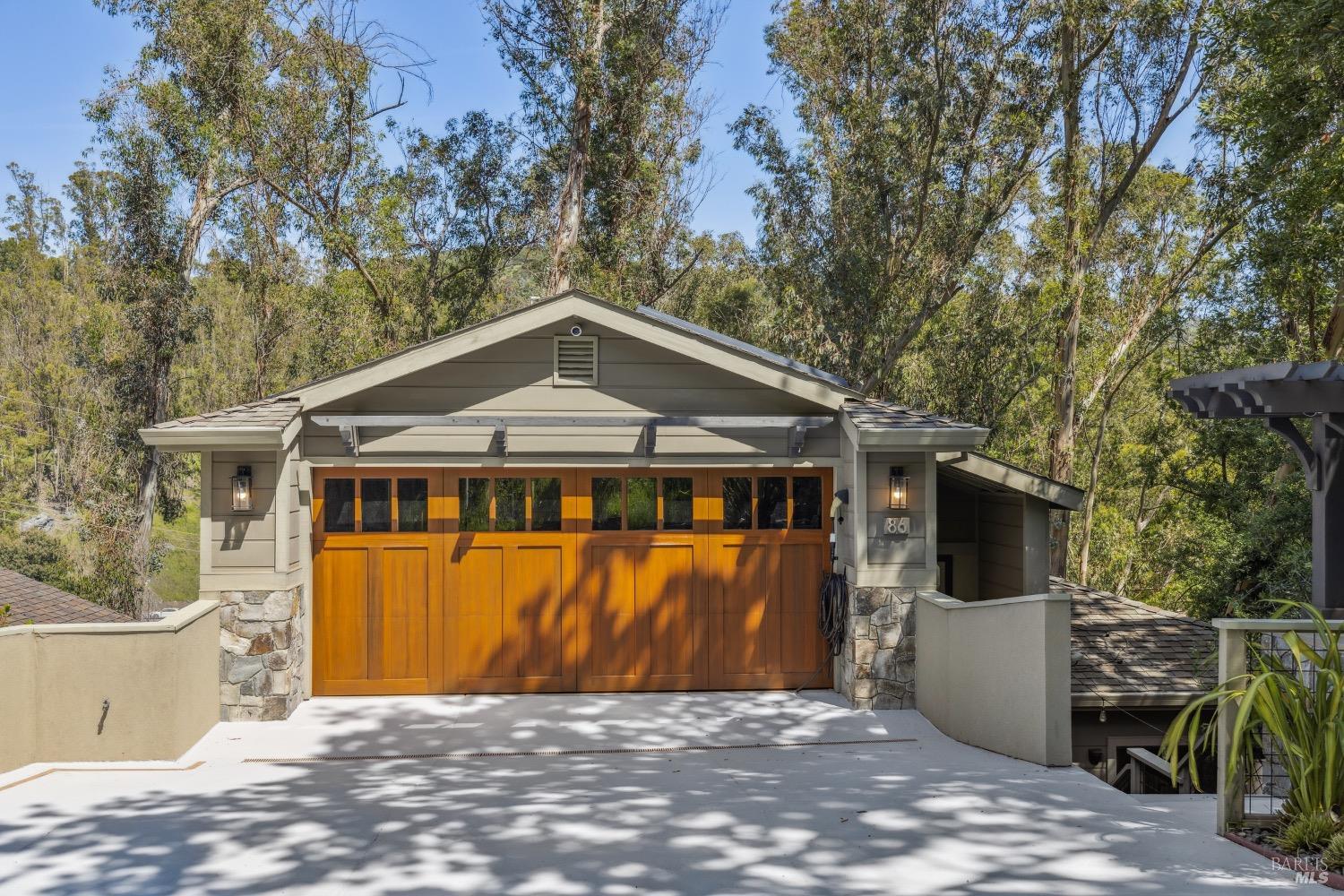 86 Fair Drive San Rafael, CA 94901 - Photo 2 of 65 a front view of a house with a garden