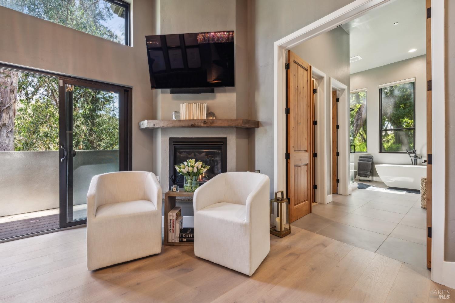 86 Fair Drive San Rafael, CA 94901 - Photo 30 of 65 a living room with furniture a fireplace and a flat screen tv