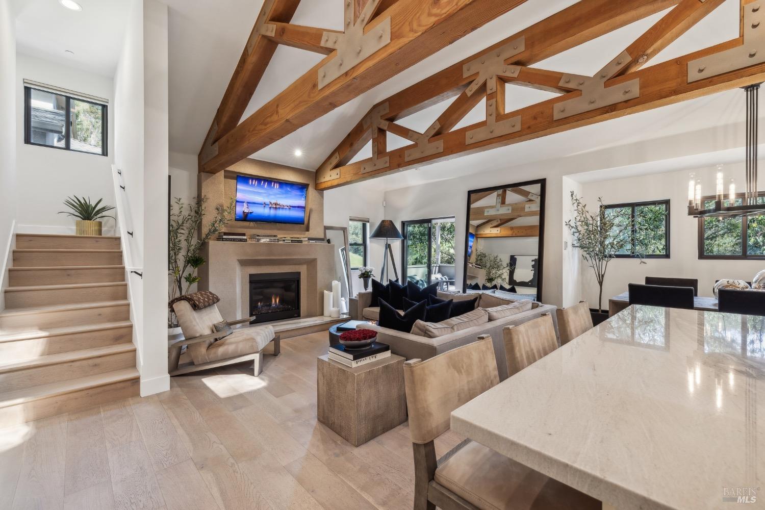 86 Fair Drive San Rafael, CA 94901 - Photo 5 of 65 a living room with furniture a fireplace and a flat screen tv