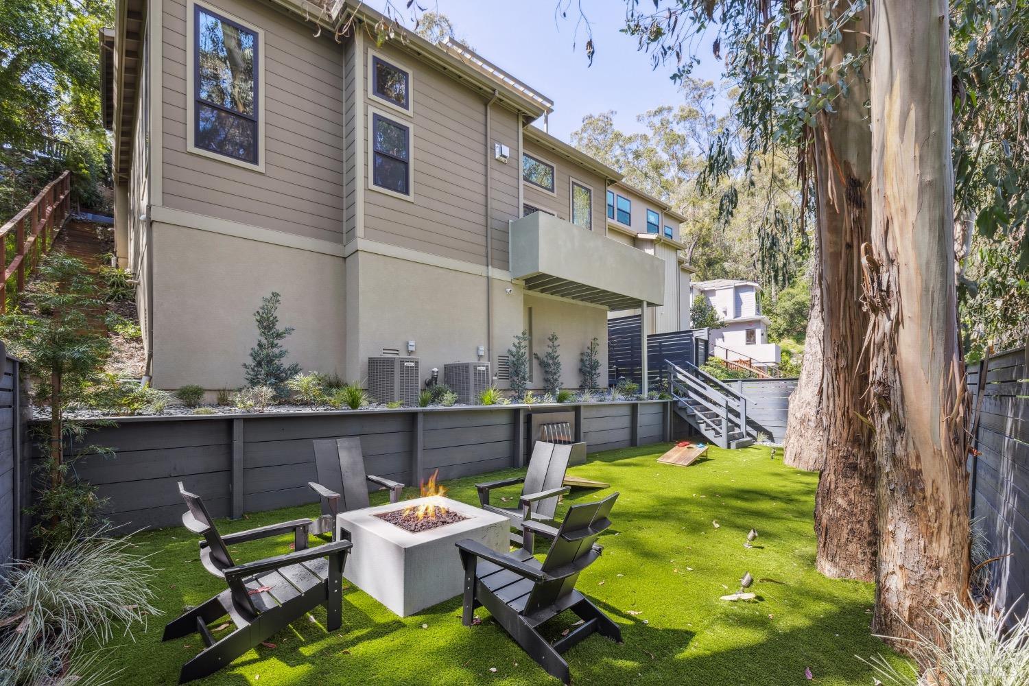 86 Fair Drive San Rafael, CA 94901 - Photo 58 of 65 a backyard of a house with outdoor seating