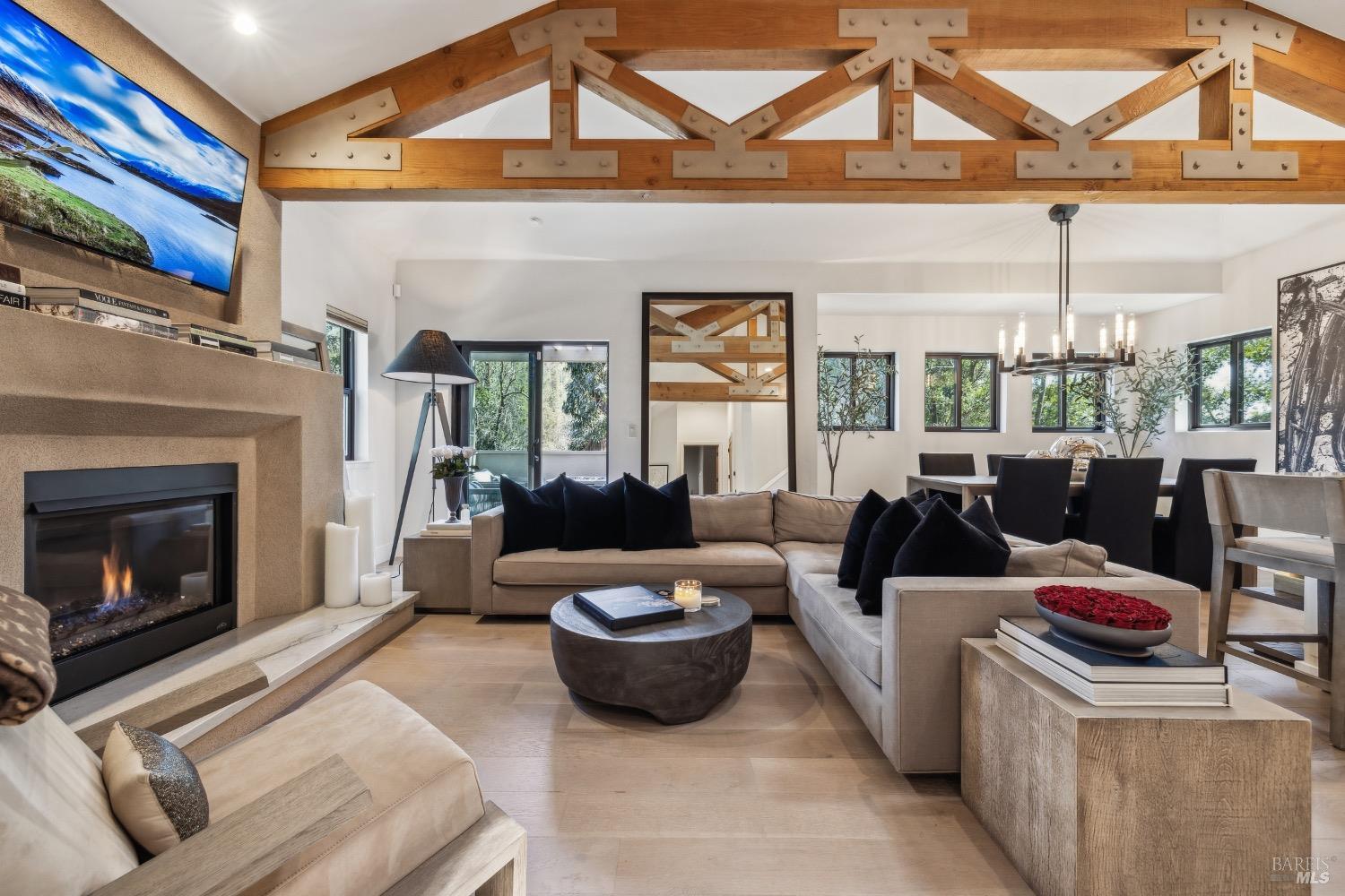 86 Fair Drive San Rafael, CA 94901 - Photo 7 of 65 a living room with furniture a fireplace and a chandelier