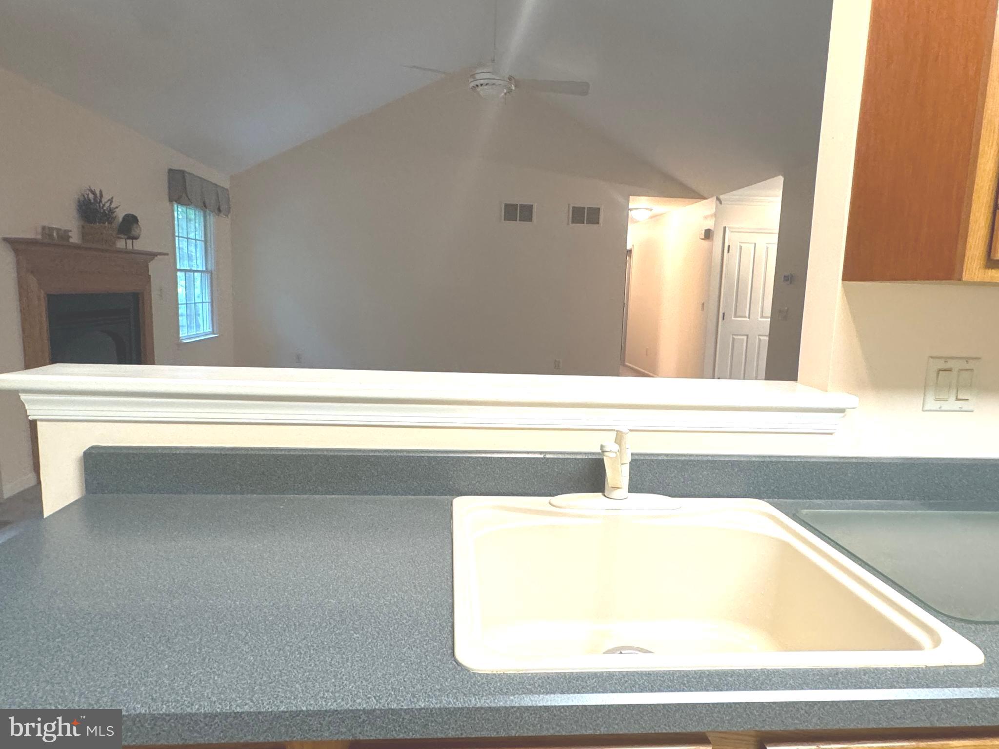34404 Owls Nest Road Lewes, DE 19958 - Photo 24 of 63 Kitchen sink overlooking family room