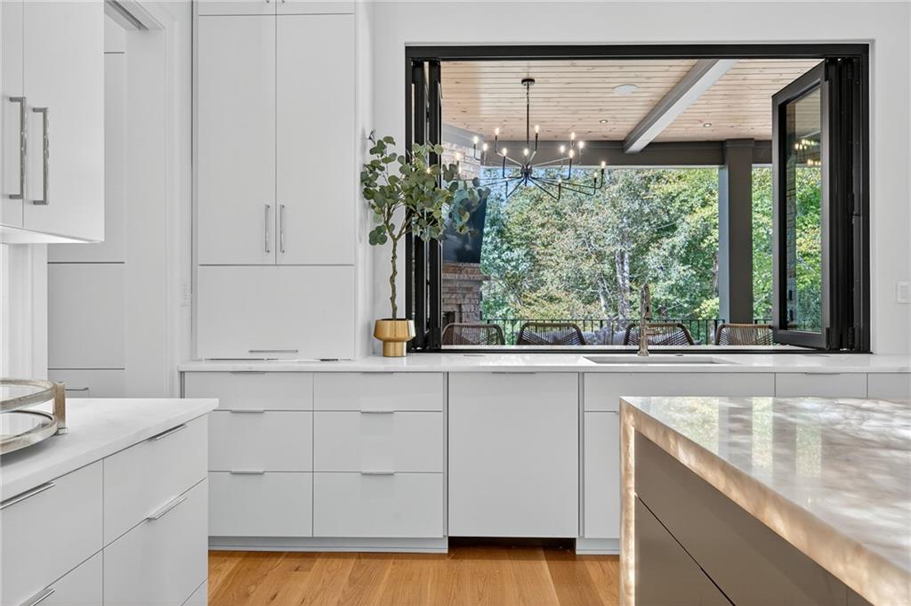 3565 Rivers Call Boulevard Atlanta, GA 30339 - Photo 13 of 78 a kitchen with a sink and large window