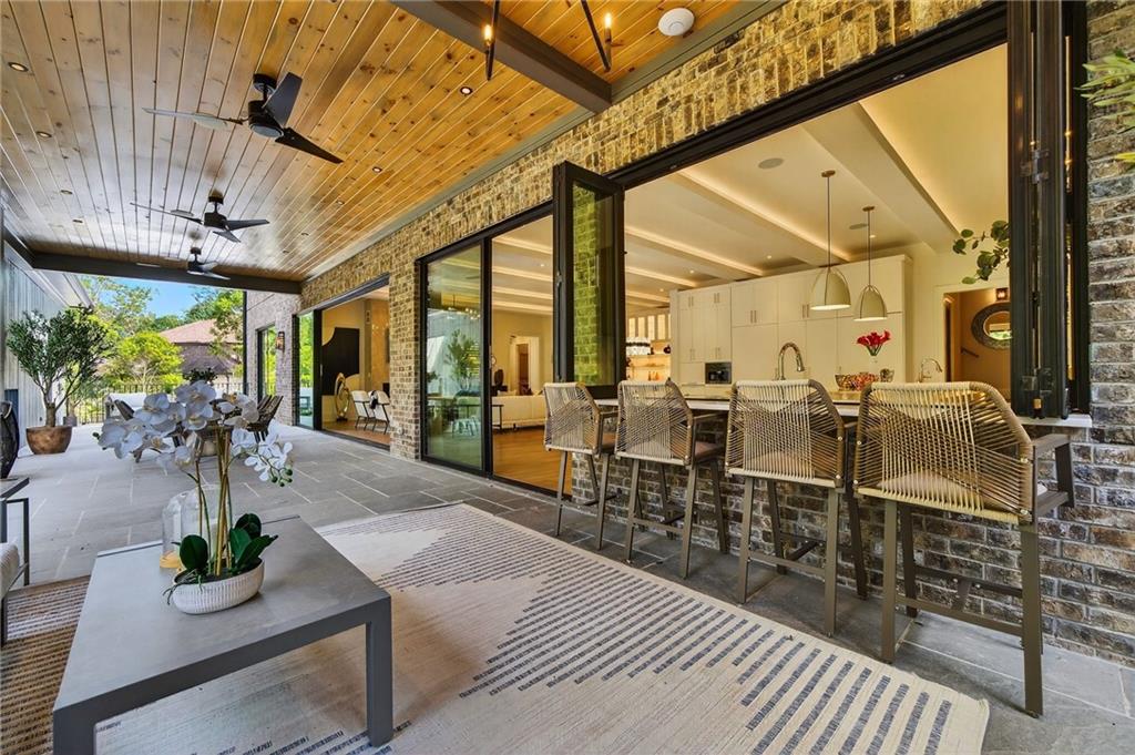 3565 Rivers Call Boulevard Atlanta, GA 30339 - Photo 14 of 78 a outdoor space with lots of tables a garden view and chairs