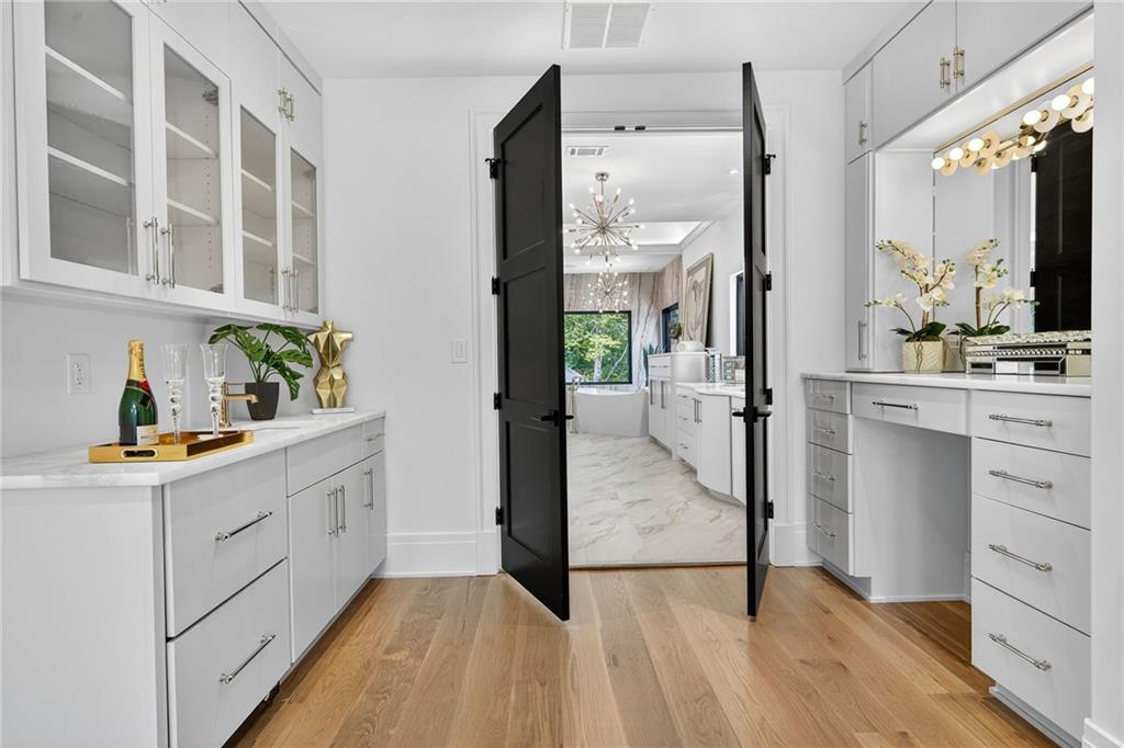 3565 Rivers Call Boulevard Atlanta, GA 30339 - Photo 30 of 78 a view of a kitchen with cabinets and wooden floor