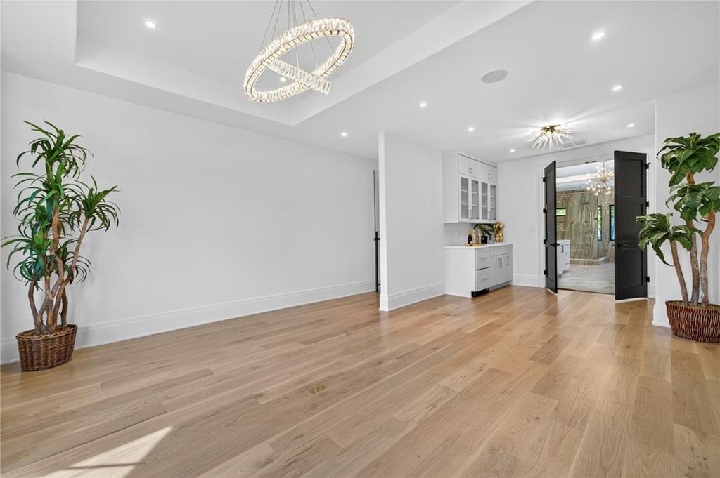 3565 Rivers Call Boulevard Atlanta, GA 30339 - Photo 31 of 78 a view of empty room with wooden floor and window