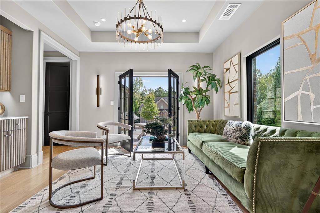 3565 Rivers Call Boulevard Atlanta, GA 30339 - Photo 45 of 78 a living room with patio furniture and a large window