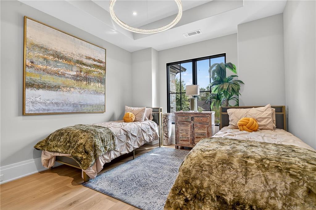 3565 Rivers Call Boulevard Atlanta, GA 30339 - Photo 50 of 78 a bedroom with two beds and a large window