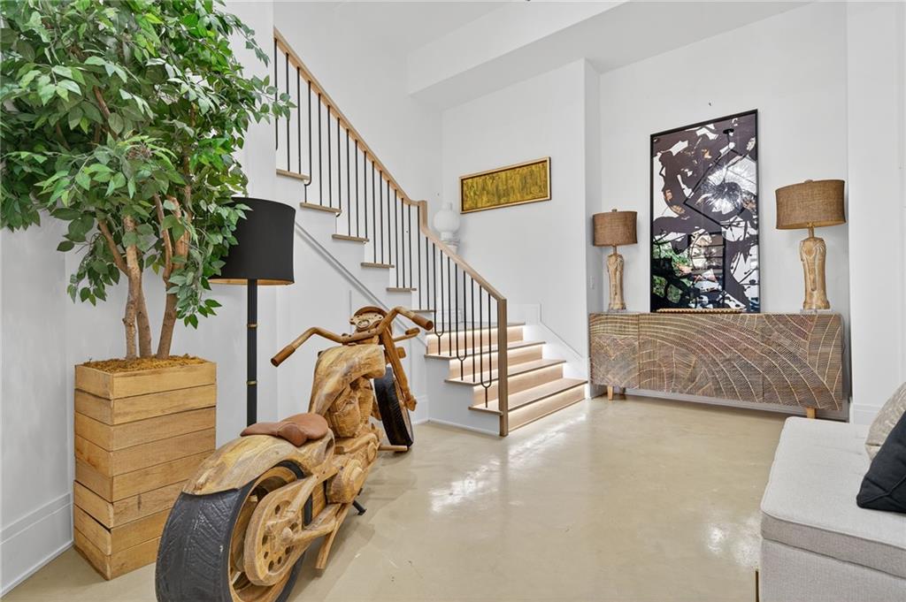 3565 Rivers Call Boulevard Atlanta, GA 30339 - Photo 55 of 78 a view of a livingroom with furniture and gym equipment