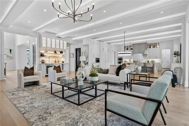 a kitchen with a sink and large window