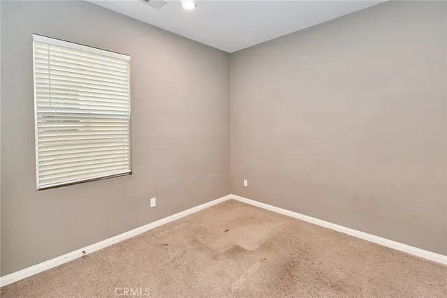 an empty room with a window