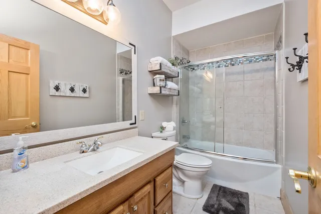 a view of a chairs and table in the balcony
