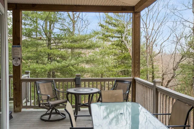 a view of balcony with furniture
