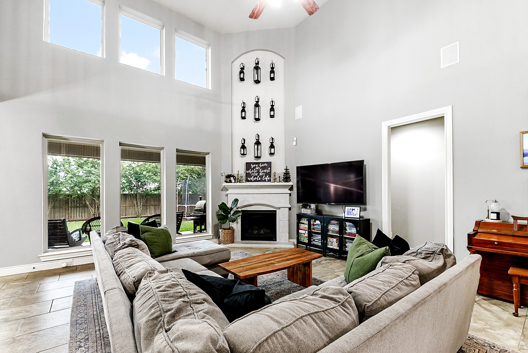 2939 Bobby Jones Road Katy, TX 77494 - Photo 22 of 50 a living room with furniture fireplace and flat screen tv