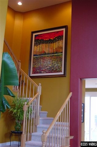 2931 Blue Grouse Drive Reno, NV 89509 - Photo 4 of 8 a view of a balcony with furniture and staircase