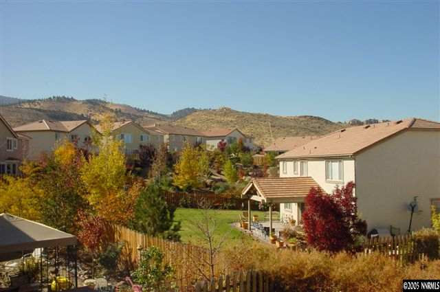 2931 Blue Grouse Drive Reno, NV 89509 - Photo 7 of 8 a view of a house with a mountain and a forest