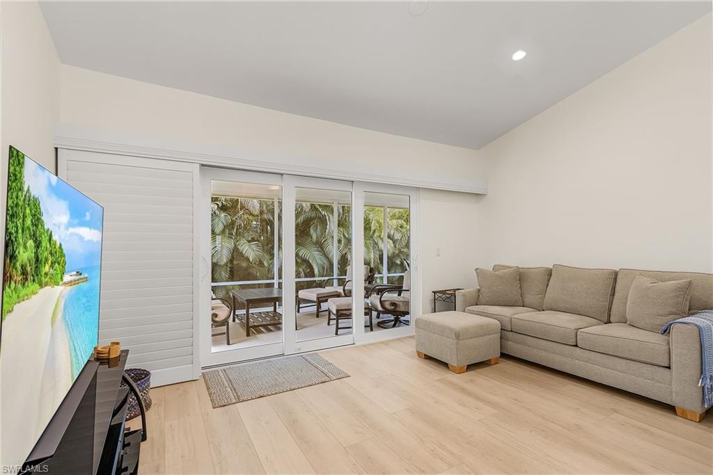 15337 Wimborne Lane, Unit 5 Naples, FL 34110 - Photo 12 of 35 Den at rear of living room