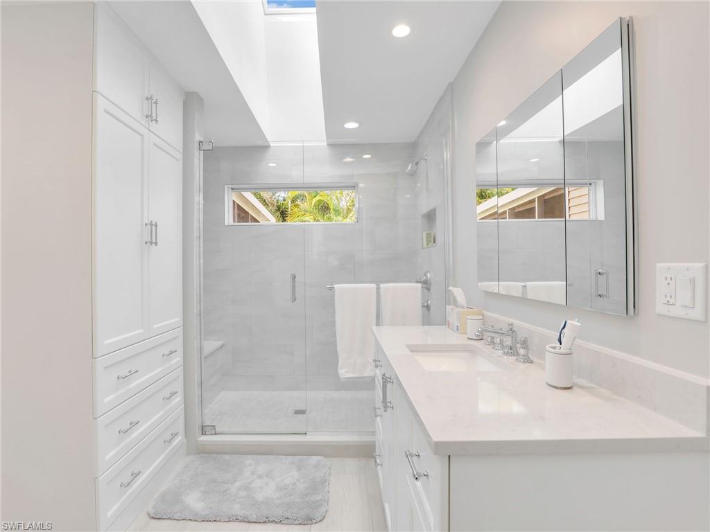 15337 Wimborne Lane, Unit 5 Naples, FL 34110 - Photo 14 of 35 Primary luxury bathroom