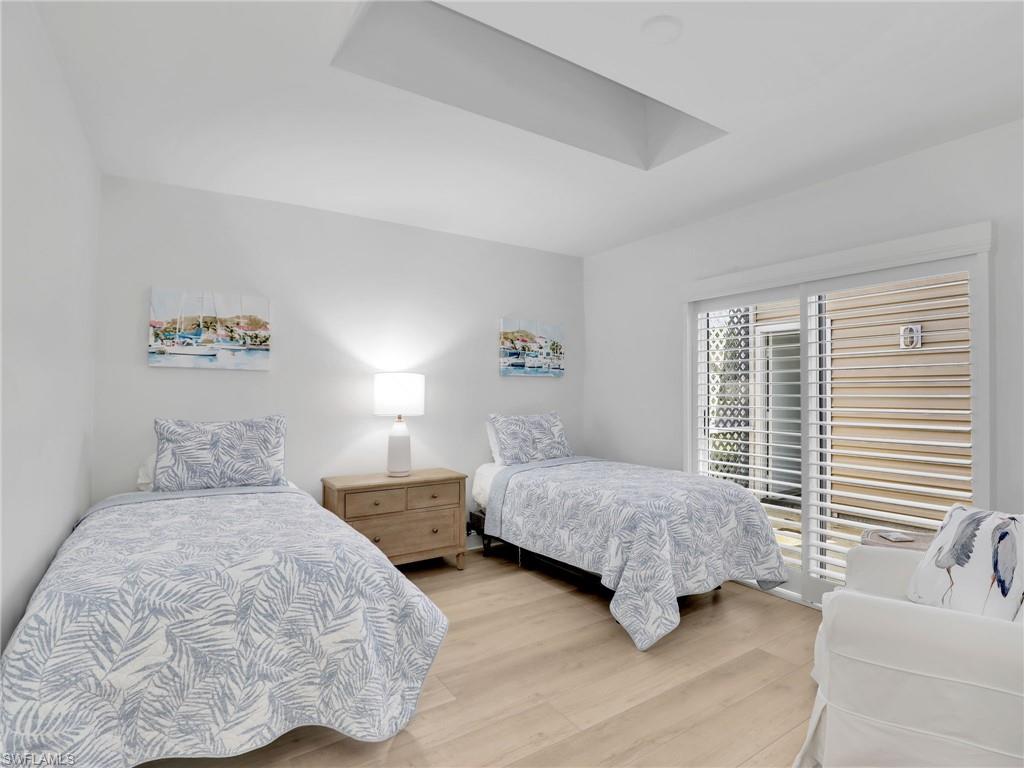 15337 Wimborne Lane, Unit 5 Naples, FL 34110 - Photo 15 of 35 Second bedroom with skylight