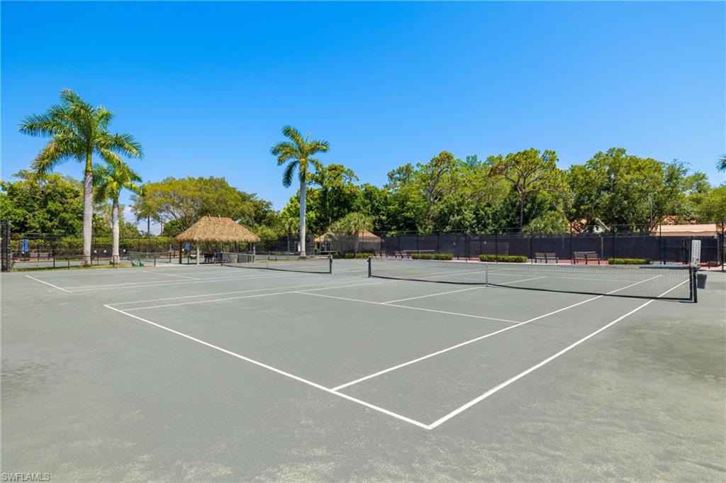 15337 Wimborne Lane, Unit 5 Naples, FL 34110 - Photo 35 of 37 a view of a tennis court
