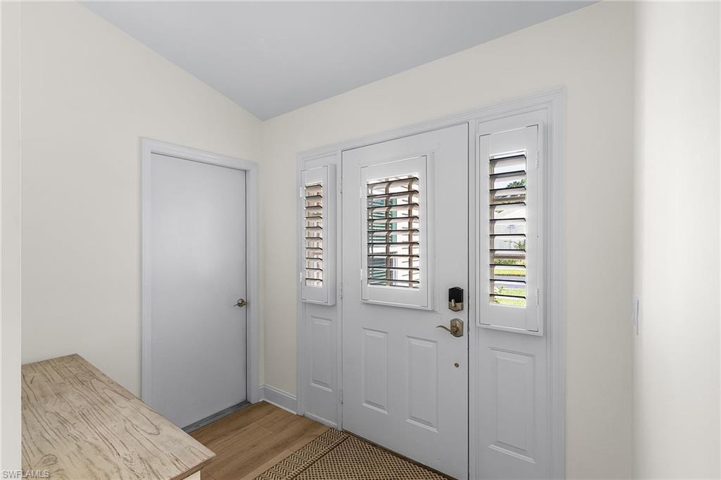 15337 Wimborne Lane, Unit 5 Naples, FL 34110 - Photo 4 of 35 Direct entrance from garage