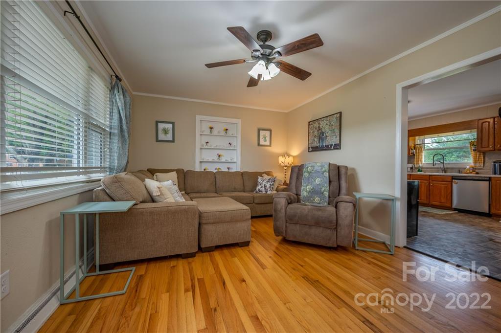 124 Crestview Street Rutherfordton, NC 28139 - Photo 6 of 28 a living room with furniture and a large window