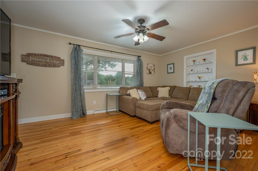 124 Crestview Street Rutherfordton, NC 28139 - Photo 8 of 28 a living room with furniture and a window