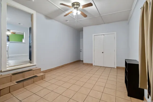 a view of an empty room and window