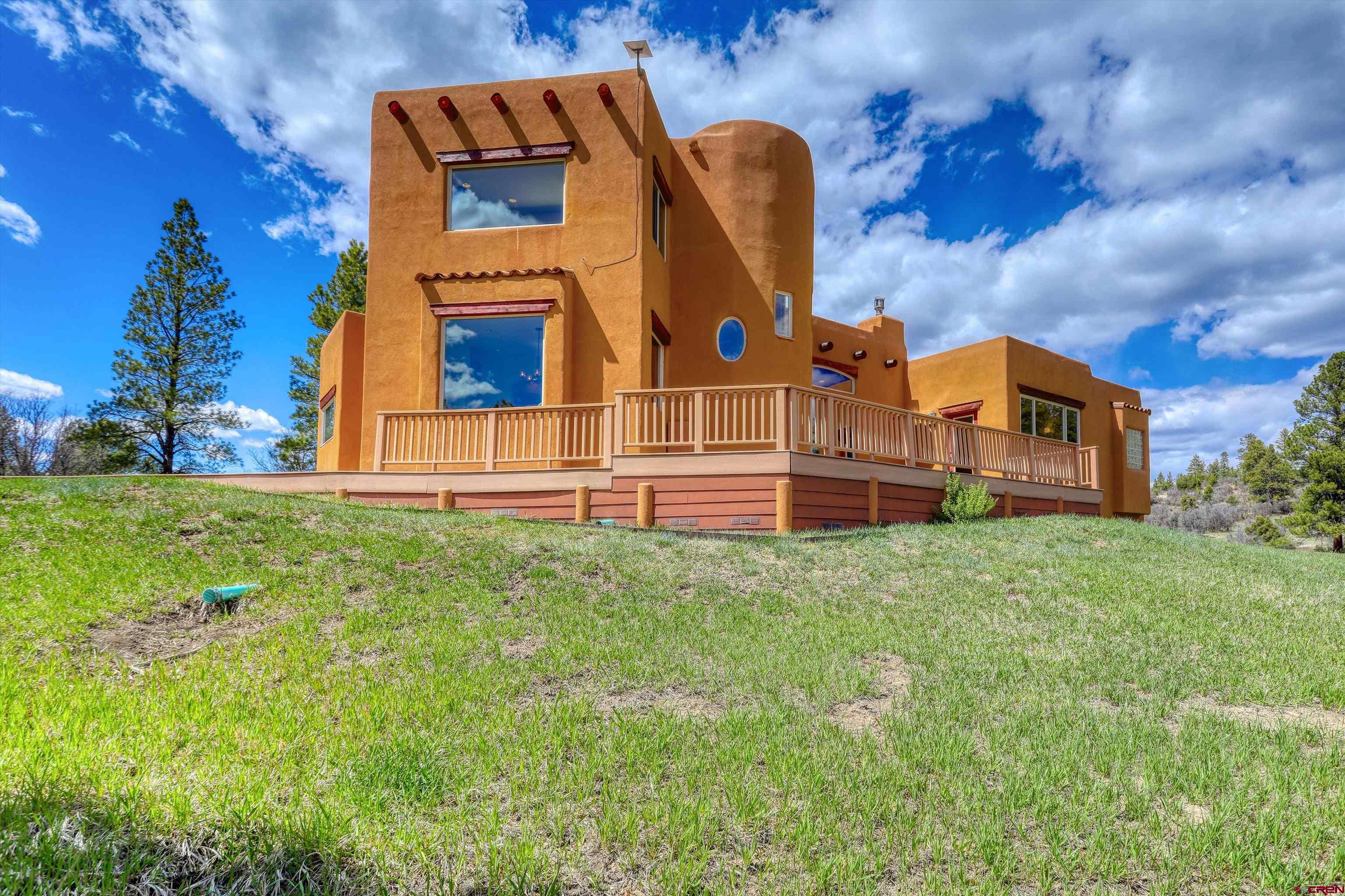 719 Spring Creek Circle Chromo, CO 81128 - Photo 29 of 45 a front view of house with yard