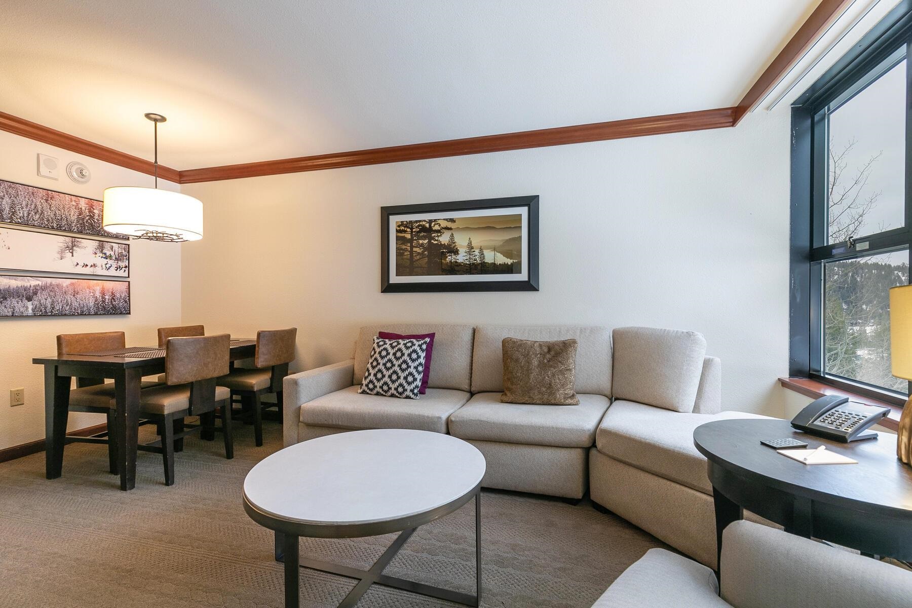 400 Squaw Creek Road, Unit 755 Olympic Valley, CA 96146 - Photo 12 of 20 a living room with furniture and a large window