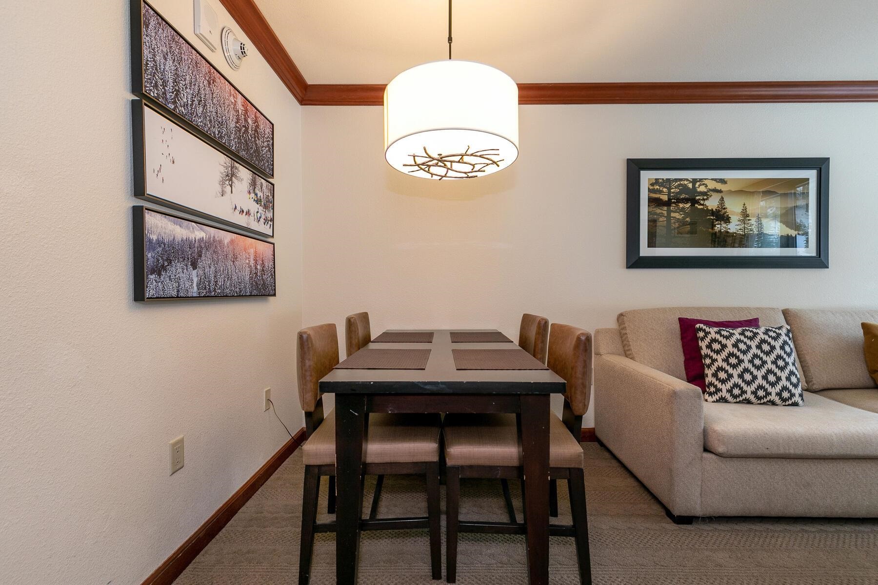 400 Squaw Creek Road, Unit 755 Olympic Valley, CA 96146 - Photo 10 of 20 a view of a dining room with furniture and a rug